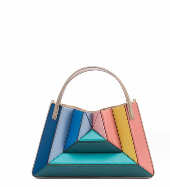 Bolso de mano con diseño de patchwork en contraste de colores y un diseño especial para llevar debajo del brazo con cordón para mujer