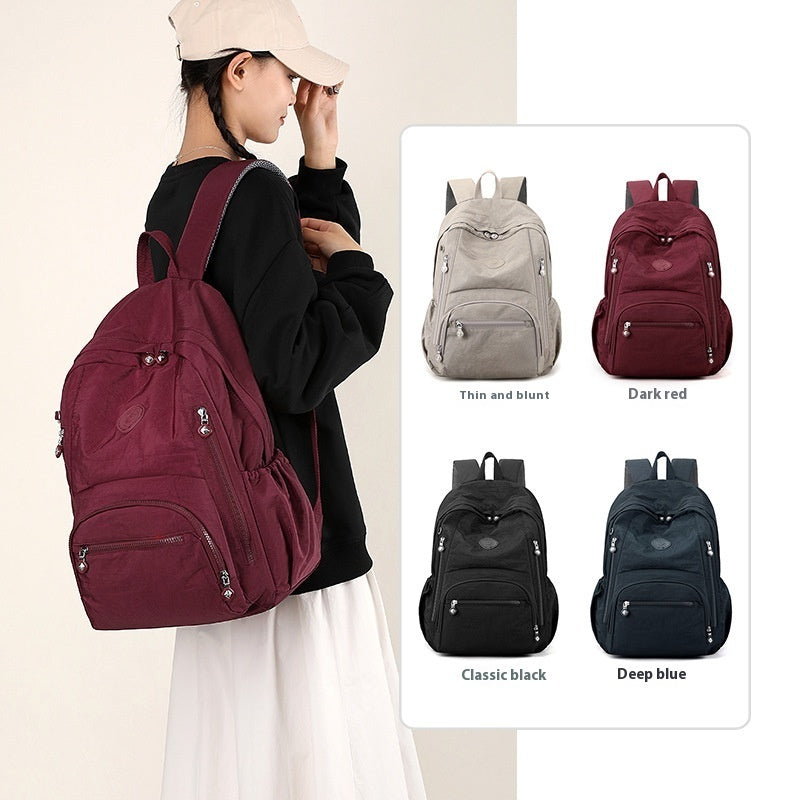 Mochila impermeable para ordenador para mujer, con múltiples bolsillos y asa cubrible