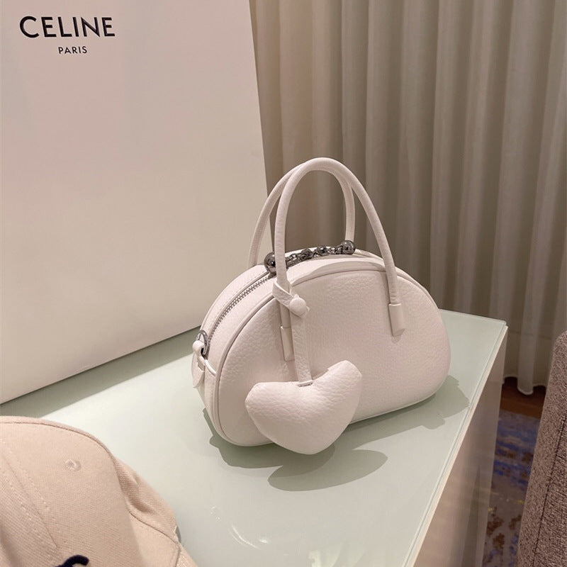 Bolso de mano 2024 para mujer, bolso cruzado de lujo con diseño de corazón, bolso sólido y conciso para mujer