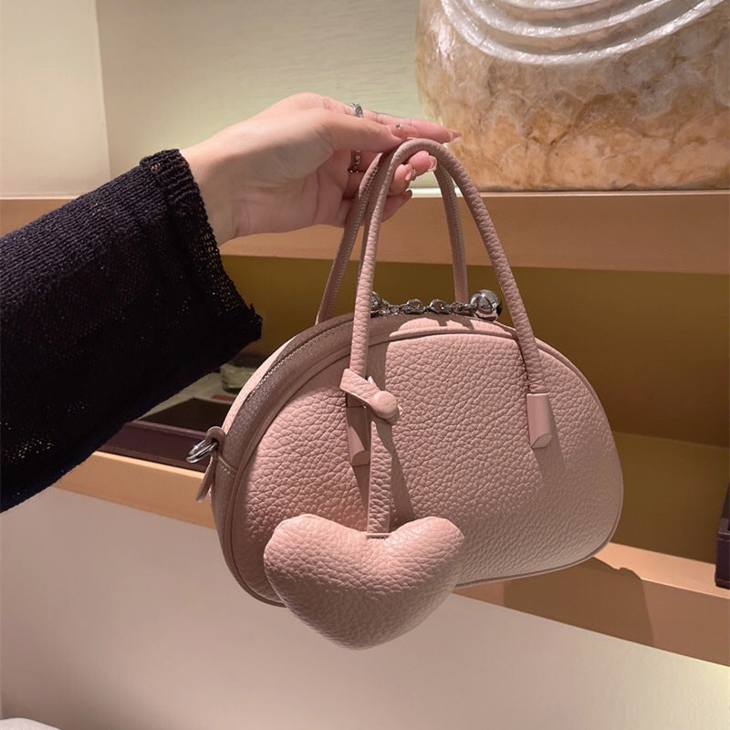 Bolso de mano 2024 para mujer, bolso cruzado de lujo con diseño de corazón, bolso sólido y conciso para mujer