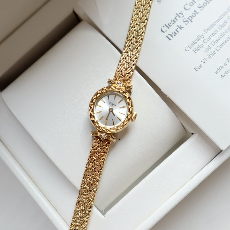 Montre pour femme simple rétro à intérêt spécial, petite montre de luxe légère en or