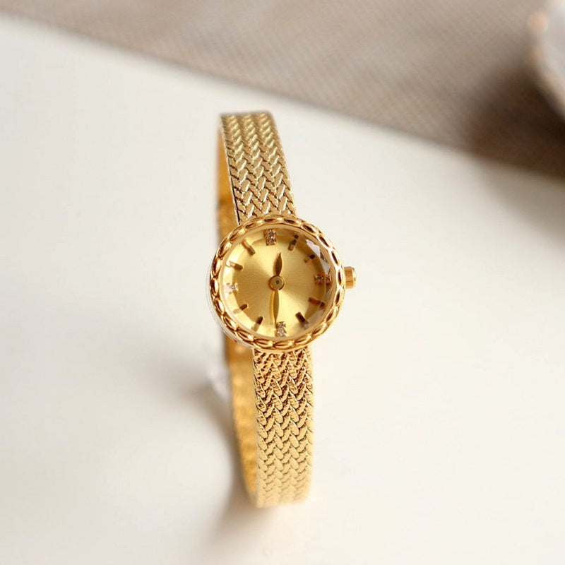 Montre pour femme simple rétro à intérêt spécial, petite montre de luxe légère en or