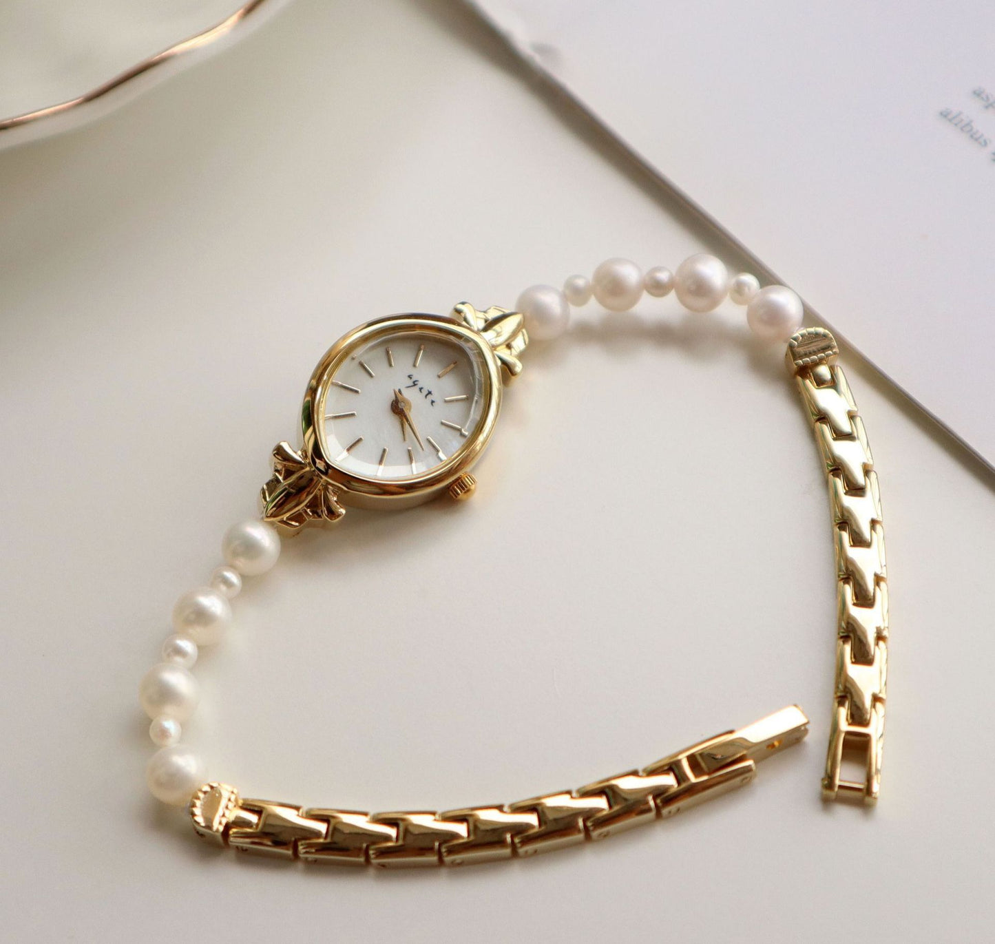 Reloj de pulsera con correa de perla de agua dulce natural, exquisito reloj de cuarzo para mujer