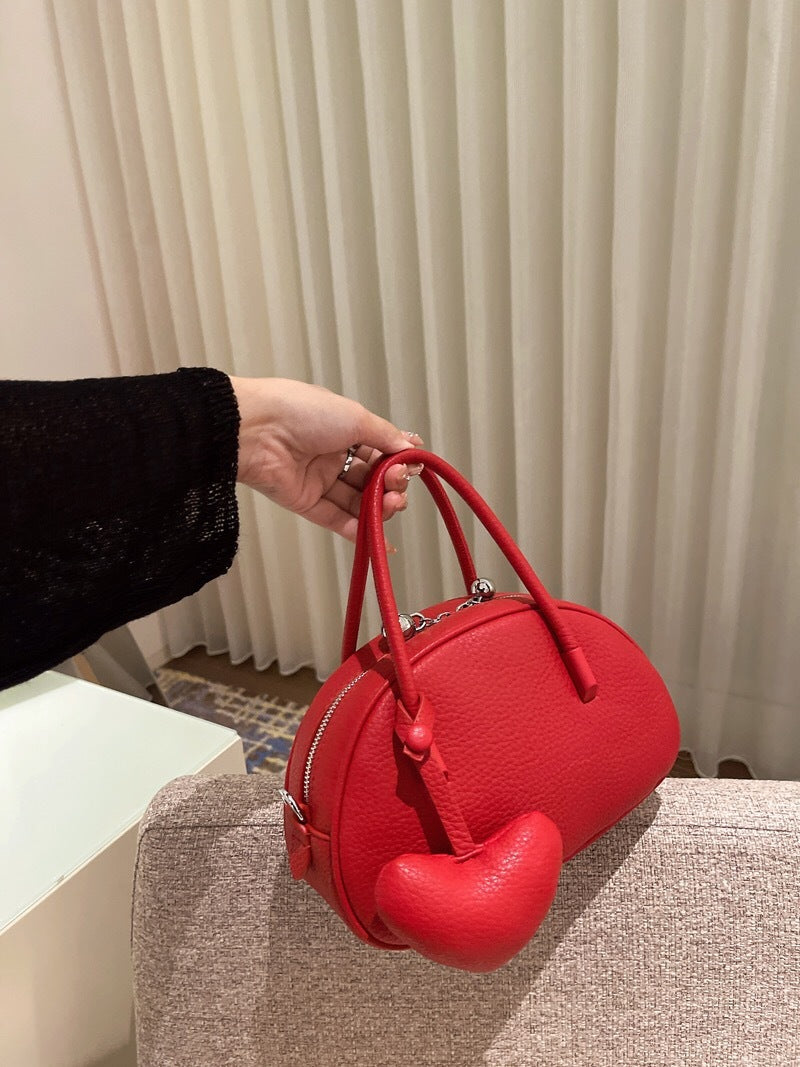 Bolso de mano 2024 para mujer, bolso cruzado de lujo con diseño de corazón, bolso sólido y conciso para mujer