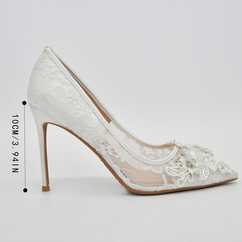 Zapatos de novia de encaje blanco con flores