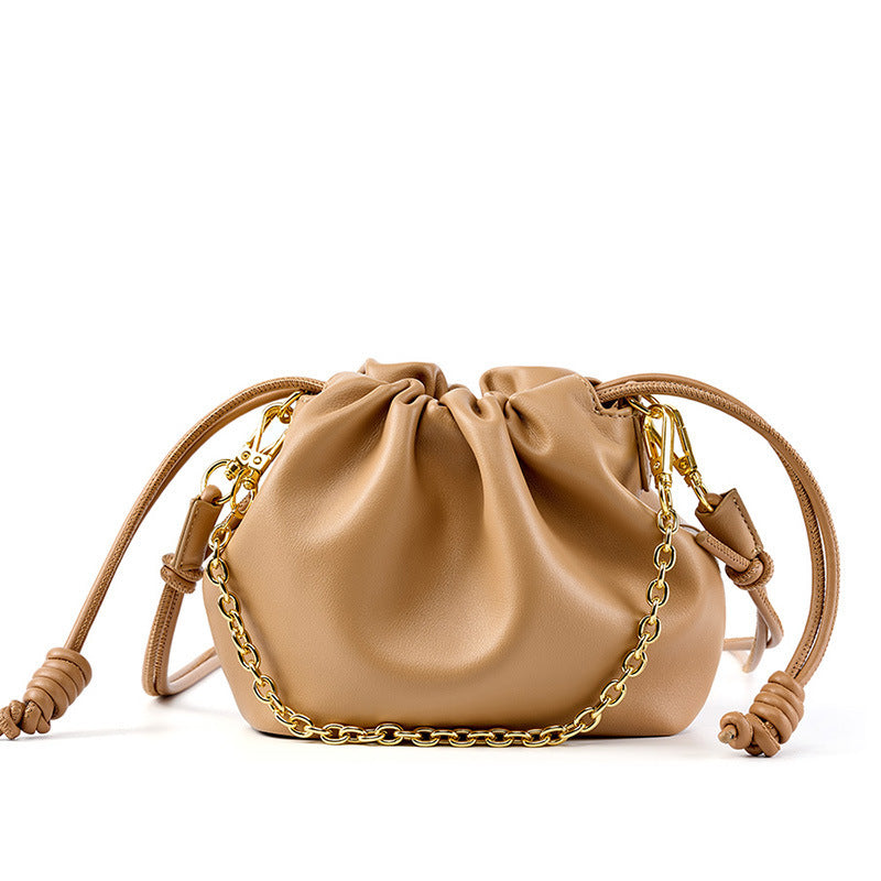 Bolso de mano de piel a juego para mujer