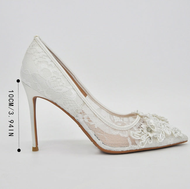 Zapatos de novia de encaje blanco con flores